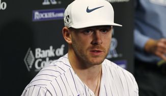 Colorado Rockies shortstop Trevor Story responds to a question during a news conference as part of the team&#39;s fan festival in Coors Field Saturday, Jan. 25, 2020, in Denver. The Rockies are preparing for the opening of spring training. (AP Photo/David Zalubowski)