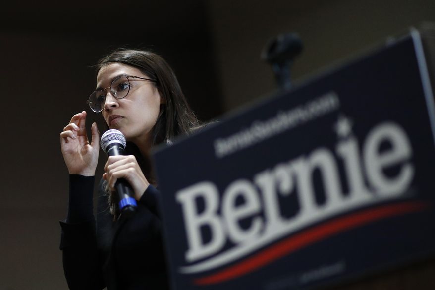 Rep. Alexandria Ocasio-Cortez, D-NY, speaks at an event for Democratic presidential candidate Sen. Bernie Sanders, I-Vt., in Storm Lake, Iowa, on Sunday, Jan. 26, 2020. (AP Photo/John Locher) **FILE**