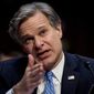 In this Nov. 5, 2019, file photo, FBI Director Christopher Wray testifies before a Senate Homeland Security Committee hearing on Capitol Hill in Washington. (AP Photo/Andrew Harnik, File) ** FILE **
