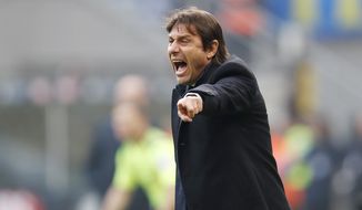 Inter Milan&#39;s head coach Antonio Conte gives instructions during the Serie A soccer match between Inter Milan and Cagliari at the San Siro Stadium, in Milan, Italy, Sunday, Jan. 26, 2020. (AP Photo/Antonio Calanni)