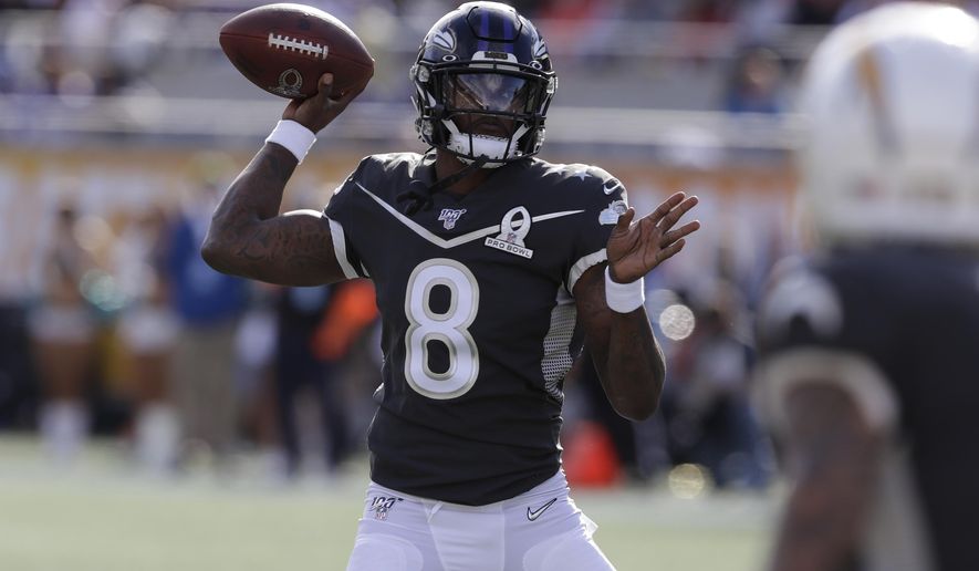 AFC quarterback Lamar Jackson, of the Baltimore Ravens, (8) looks to pass, during the first half of the NFL Pro Bowl football game against the NFC, Sunday, Jan. 26, 2020, in Orlando, Fla. (AP Photo/Chris O&#x27;Meara)