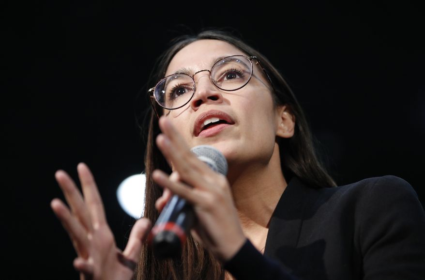 Rep. Alexandria Ocasio-Cortez, D-NY, speaks at a rally for democratic presidential candidate Sen. Bernie Sanders, I-Vt., Sunday, Jan. 26, 2020, in Sioux City, Iowa. (AP Photo/John Locher)
