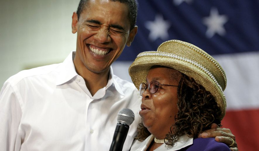 In this Oct. 6, 2007, file photo, then-presidential hopeful Sen. Barack Obama, D-Ill., left, shares a laugh with Greenwood County, S.C., Council Woman, Edith Childs, right, whom he credited with giving him the idea for his popular &quot;Fire It Up,&quot; campaign chant in a packed gymnasium at South Aiken High School, in Aiken, S.C. Childs, the woman credited with popularizing a memorable slogan and chant that epitomized the 2008 campaign of then-Sen. Barack Obama has endorsed Tom Steyer&#x27;s presidential bid. (AP Photo/Brett Flashnick, File)
