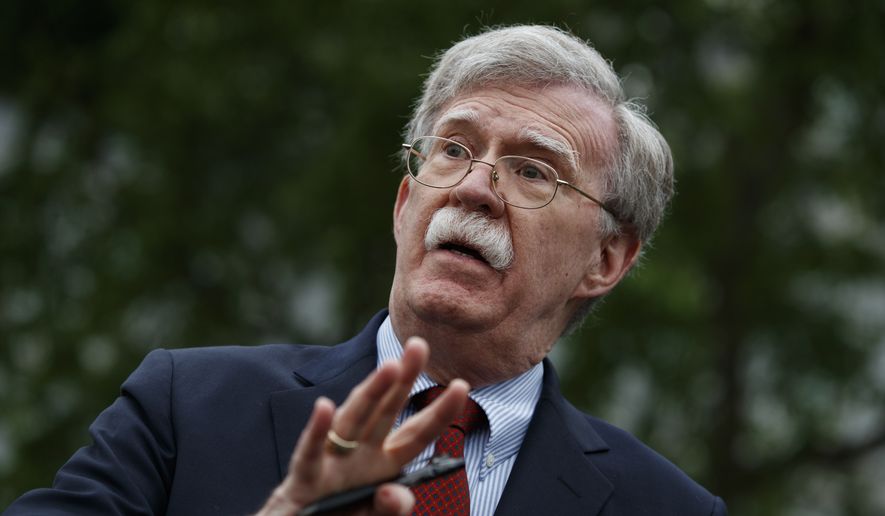 Then-National Security Adviser John Bolton talks to reporters outside the White House in Washington, May 1, 2019. (AP Photo/Evan Vucci)  ** FILE ** 