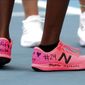 United States&#39; Coco Gauff, front, and compatriot Caty McNally wear a tribute to Kobe Bryant on their shoes during their doubles match against Japan&#39;s Shuko Aoyama amd Ena Shibahara at the Australian Open tennis championship in Melbourne, Australia, Monday, Jan. 27, 2020. (AP Photo/Dita Alangkara)