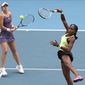 United States&#39; Coco Gauff, right, and compatriot Caty McNally play in their third round doubles match against Japan&#39;s Shuko Aoyama and Ena Shibahara at the Australian Open tennis championship in Melbourne, Australia, Monday, Jan. 27, 2020. (AP Photo/Dita Alangkara)