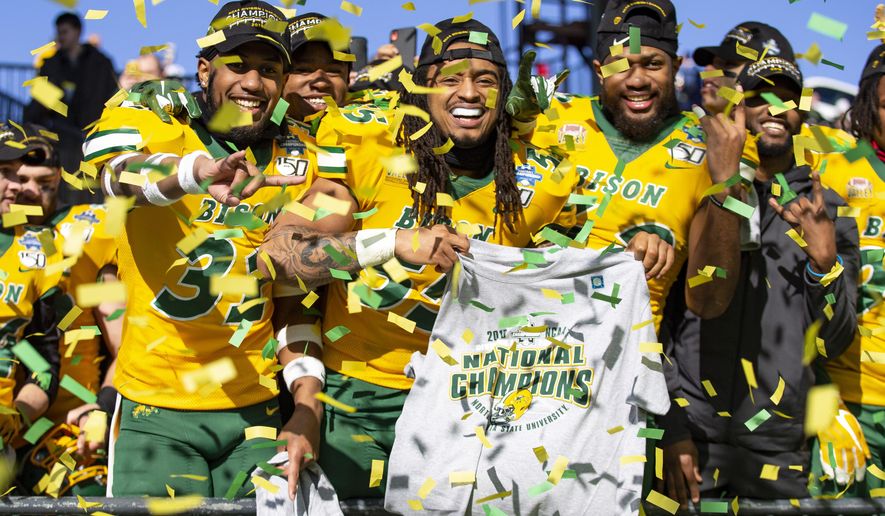North Dakota State linebackers Jasir Cox (31), Aaron Mercadel (55), and Jabril Cox (42) celebrate after beating James Madison 28-20 in FCS championship NCAA college football game, Saturday, Jan. 11, 2020, in Frisco, Texas. (AP Photo/Sam Hodde)