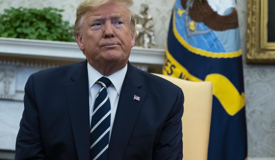 President Donald Trump pauses during a meeting with Israeli Prime Minister Benjamin Netanyahu in the Oval Office of the White House, Monday, Jan. 27, 2020, in Washington. (AP Photo/ Evan Vucci)