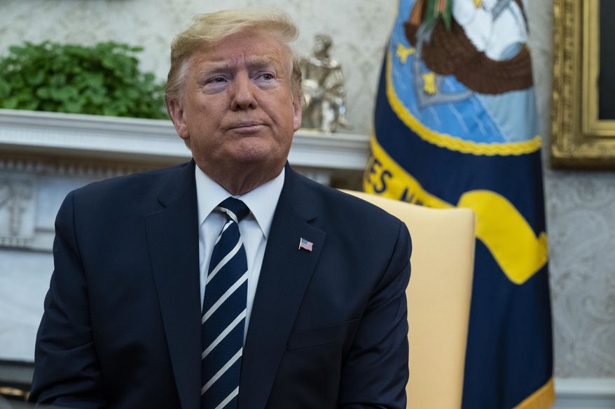 President Donald Trump pauses during a meeting with Israeli Prime Minister Benjamin Netanyahu in the Oval Office of the White House, Monday, Jan. 27, 2020, in Washington. (AP Photo/ Evan Vucci)