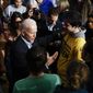 Democratic presidential candidate former Vice President Joe Biden meets with attendees during a campaign event, Monday, Jan. 27, 2020, in Iowa City, Iowa. (AP Photo/Matt Rourke)