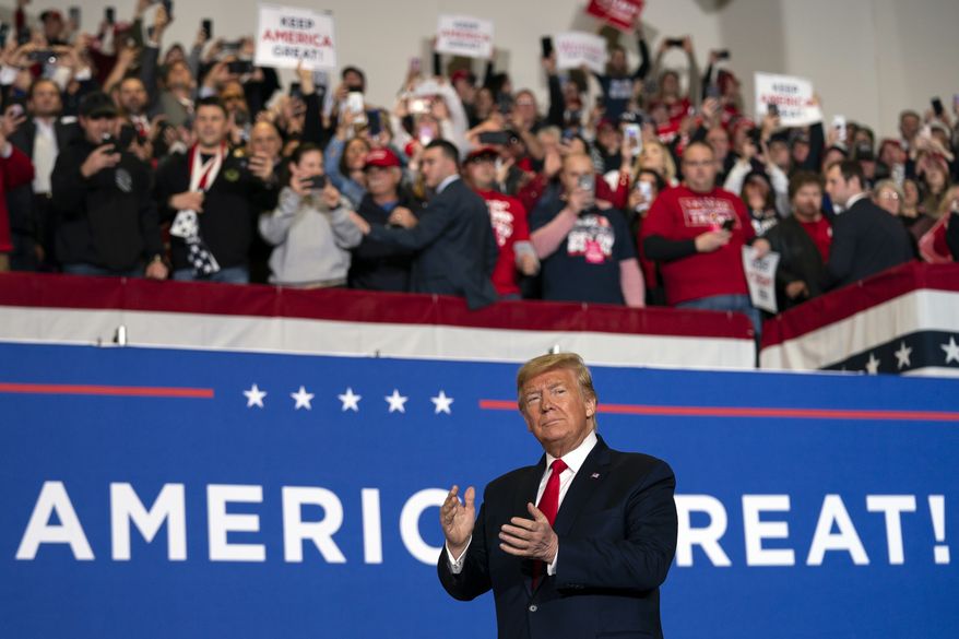 President Donald Trump arrives to speak at a campaign rally at the Wildwoods Convention Center Oceanfront, Tuesday, Jan. 28, 2020, in Wildwood, N.J. (AP Photo/ Evan Vucci)