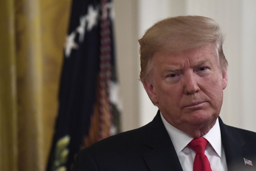 President Donald Trump listens during an event with Israeli Prime Minister Benjamin Netanyahu in the East Room of the White House in Washington, Tuesday, Jan. 28, 2020, to announce the Trump administration's much-anticipated plan to resolve the Israeli-Palestinian conflict. (AP Photo/Susan Walsh)