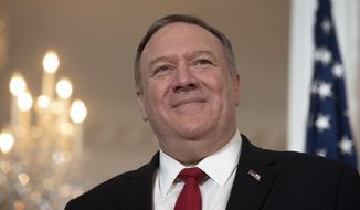 Secretary of State Mike Pompeo meets with Laotian Foreign Minister Saleumxay Kommasith, at the State Department. in Washington, Tuesday, Jan. 28, 2020. (AP Photo/Cliff Owen) **FILE**