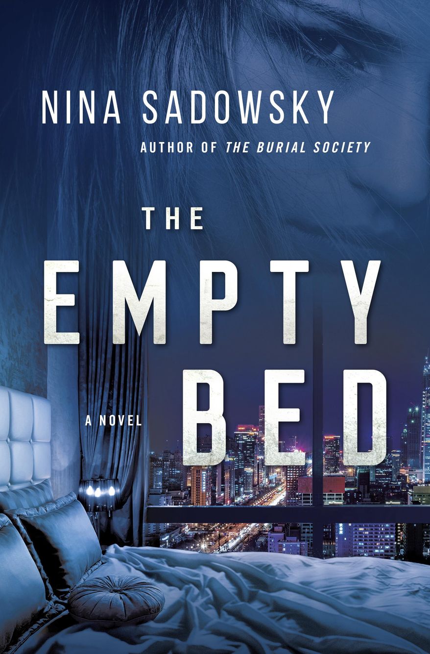 This cover image released by Ballantine shows "The Empty Bed" by Nina Sadowsky. (Ballantine via AP)