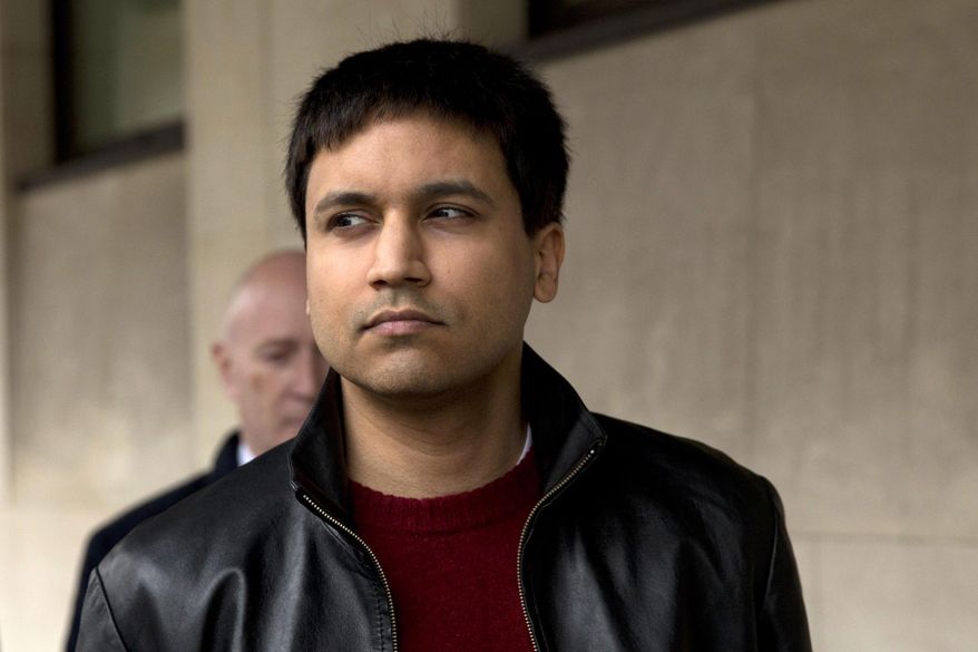 FILE - In this March 23, 2016 file photo, British futures trader Navinder Singh Sarao leaves after the ruling in his extradition hearing at Westminster Magistrates Court in London. A U.S. judge on Tuesday, Jan. 28, 2020, sentenced Navinder Singh Sarao, a socially awkward math whiz-turned-futures trader who helped trigger a U.S. stock market "flash crash" from his parents' suburban London home to time served and a year's home confinement, sparing him imprisonment after prosecutors praised his cooperation and said his crimes were unmotivated by greed. (AP Photo/Matt Dunham, File)