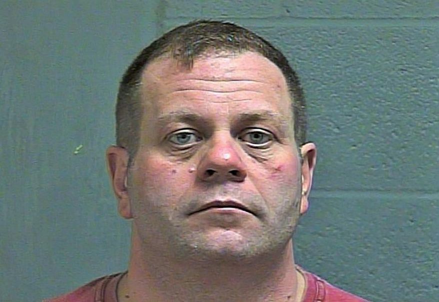 This booking photo provided by Oklahoma County Police Dept. shows Robert McClatchie. McClatchie, an Oklahoma County assistant district attorney, was booked into Oklahoma County jail at about 4 a.m. Saturday, Jan. 25, 2020, on complaints of domestic abuse by strangulation and domestic abuse in the presence of a minor child. (Oklahoma County Police Dept. via AP)