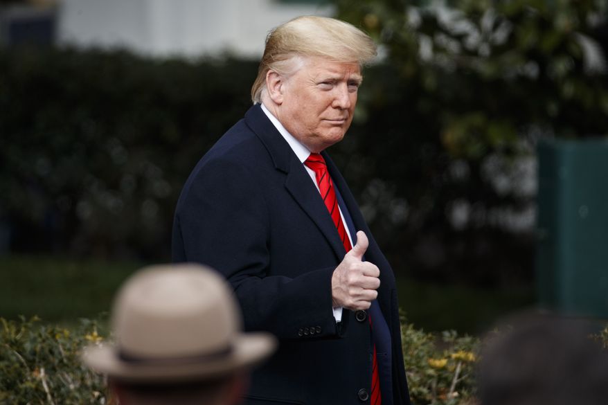 President Donald Trump gives thumbs-up as he arrives to speak at an event at the White House to sign a new North American trade agreement with Canada and Mexico, Wednesday, Jan. 29, 2020, in Washington. (AP Photo/Alex Brandon)