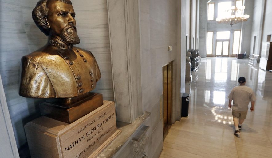 FILE - In this Aug. 17, 2017 file photo, a bust of Nathan Bedford Forrest is displayed in the Tennessee State Capitol in Nashville, Tenn. Tennessee lawmakers on Tuesday, Jan. 28, 2020,  remained torn on whether to support a proposal the removal of a contentious bust of a former Confederate general and early leader of the Ku Klux Klan. If approved by the GOP-controlled Legislature, the measure encourages the bust of Nathan Bedford Forrest be removed from the Tennessee Capitol and instead be replaced with an “appropriate tribute to a deserving Tennessean.” (AP Photo/Mark Humphrey, File)