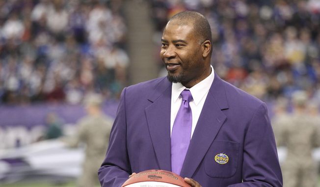In this Dec. 15, 2013, file photo, former Minnesota Viking Chris Doleman acknowledges the crowd during a ceremony honoring the All Mall of America Field team during halftime of an NFL football game between the Vikings and the Philadelphia Eagles in Minneapolis. Hall of Fame defensive end Doleman, who became one of the NFL&#x27;s most feared pass rushers during 15 seasons in the league, has died. He was 58. The Vikings and Pro Football Hall of Fame president and CEO David Baker offered their condolences in separate statements late Tuesday night, Jan. 29, 2020. (AP Photo/Andy King, File)