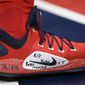 Washington Wizards guard Bradley Beal&#39;s shoes pay tribute to the late Kobe Bryant as he warms up before an NBA basketball game against the Charlotte Hornets, Thursday, Jan. 30, 2020, in Washington. (AP Photo/Nick Wass)