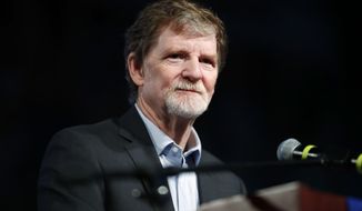 FILE - This Nov. 8, 2017 file photo shows Jack Phillips, owner of Masterpiece Cake, during a rally in Lakewood, Colo. Phillips, the Colorado cake shop owner whose refusal to design a wedding cake for a same sex couple led to landmark Supreme Court ruling, has a book deal. Phillips&#39; memoir, currently untitled, will be released this summer by Salem Books Publishing. (AP Photo/David Zalubowski, File)
