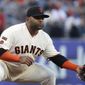 FILE - In this July 22, 2019, file photo, San Francisco Giants third baseman Pablo Sandoval get set during a baseball game against the Chicago Cubs in San Francisco. The 33-year-old Sandoval is working back from season-ending Tommy John reconstructive surgery on his right elbow. (AP Photo/Jeff Chiu, File)
