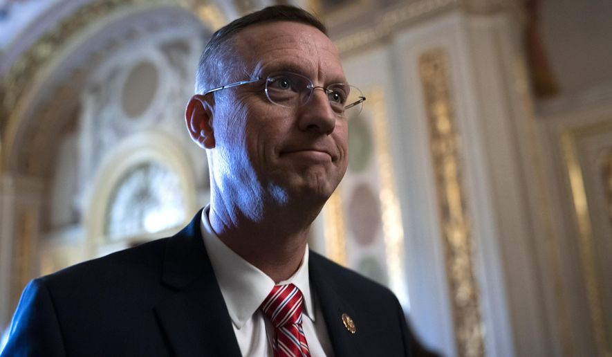 Rep. Doug Collins, R-Ga, the ranking member of the House Judiciary Committee, emerges from a conference room working with other allies of President Donald Trump during his impeachment trial, at the Capitol in Washington, Wednesday, Jan. 29, 2020. Collins announced Wednesday that he&#x27;s running for the U.S. Senate seat held by a fellow Republican sworn in just weeks ago, GOP Sen. Kelly Loeffler. (AP Photo/J. Scott Applewhite)