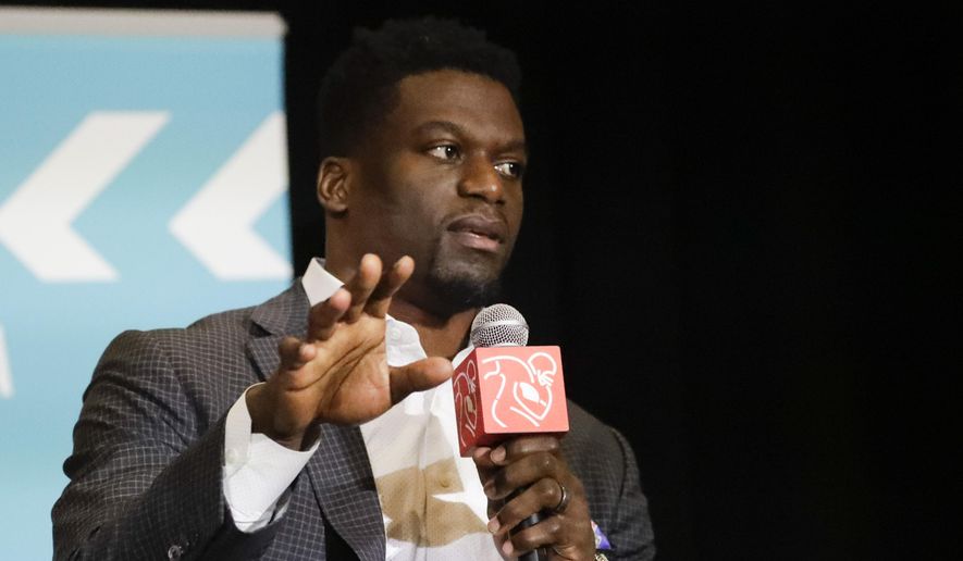 In this file photo, New England Patriots&#39; Benjamin Watson speaks during the NFL Players Association annual state of the union news conference on Thursday, Jan. 30, 2020, in Miami Beach, Fla. (AP Photo/Chris Carlson)  **FILE**