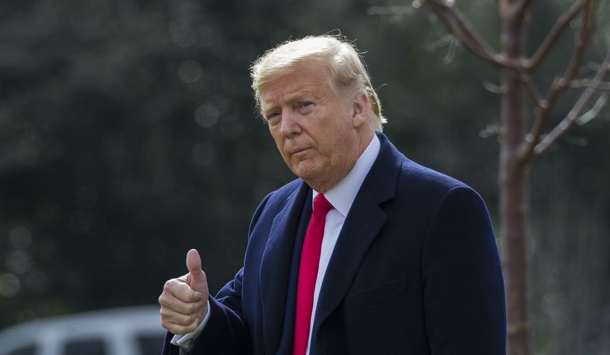 President Donald Trump gives a thumbs up as he walks on the South Lawn of the White House before boarding Marine One for a short trip to Andrews Air Force Base, Md., and then on to Michigan and Iowa, Thursday, Jan. 30, 2020, in Washington.  (AP Photo/Alex Brandon)