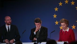 From right, European Commission President Ursula von der Leyen, European Parliament President David Sassoli and European Council President Charles Michel participate in speak a media conference at the Parliamentarium in Brussels, Friday, Jan. 31, 2020. The U.K. is due to leave the EU on Friday the first nation in the bloc to do so. (AP Photo/Virginia Mayo)