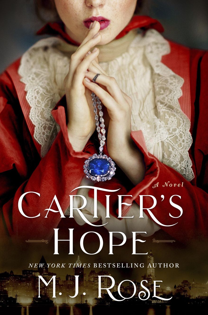 This cover image released by Atria shows "Cartier's Hope" by M.J. Rose. (Atria via AP)