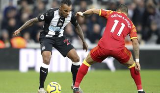Newcastle United&#39;s Valentino Lazaro, left and Norwich City&#39;s Onel Hernandez battle for the ball, during the English Premier League soccer match between AFC Bournemouth and Aston Villa, at the Vitality Stadium, Bournemouth, England, Saturday, Feb. 1, 2020. (Mark Kerton/PA via AP)