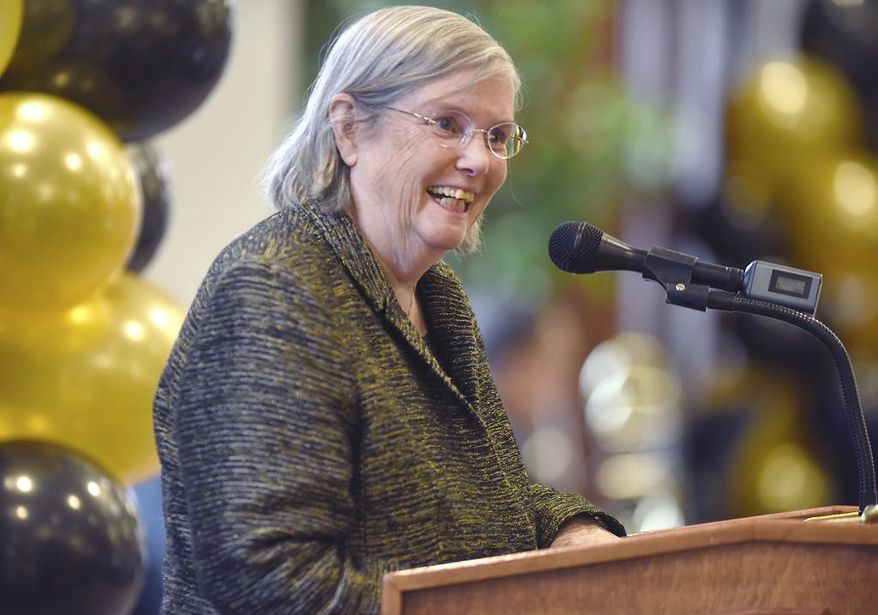 In this April 8, 2018, photo, Jeanne Sinquefield speaks during the Missouri University School of Music's groundbreaking ceremony for the Sinquefield Music Center on the Columbia, Missouri campus. The support of music programs by Sinquefield and her husband, Rex, started years ago with the idea to put a $50,000 gift toward the establishment of the Creating Original Music Project, a composition contest for K-12 students in Missouri that was first held in 2006. (Hailey Hofer/Missourian via AP)