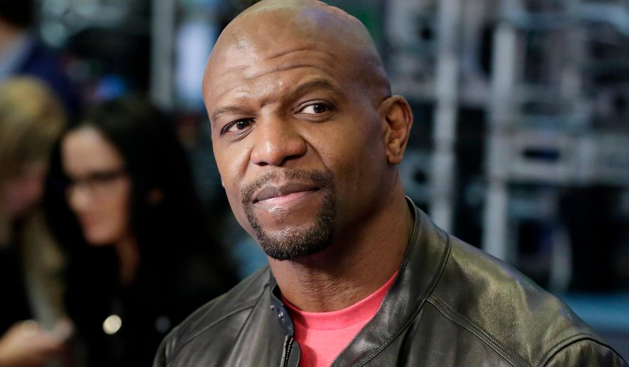 Actor Terry Crews appears on the floor of the New York Stock Exchange in New York, April 10, 2018. (AP Photo/Richard Drew) ** FILE ** 