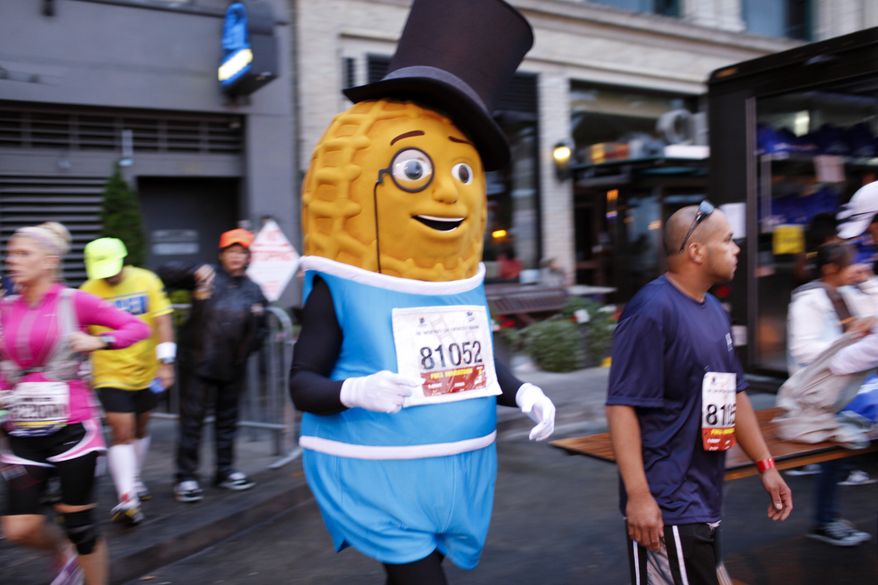COMMERCIAL IMAGE - In this photograph taken by AP Images for PLANTERS, Mr. Peanut prepares for his first marathon run at the Wipro San Francisco Marathon in San Francisco, Sunday, July 29, 2012.  (Alison Yin/AP Images for PLANTERS)