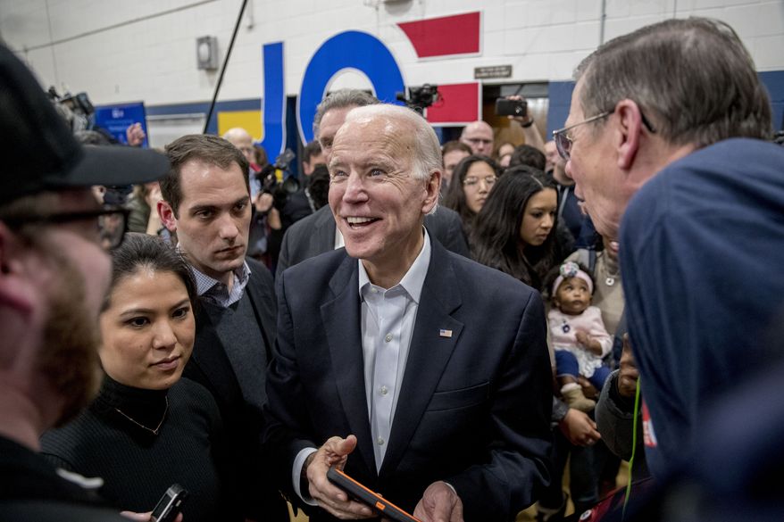 Democratic presidential candidate former Vice President Joe Biden speaks at a campaign stop at Hiatt Middle School, Sunday, Feb. 2, 2020, in Des Moines, Iowa. (AP Photo/Andrew Harnik)