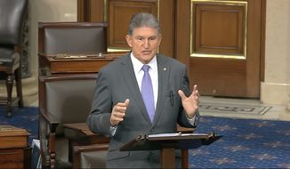 In this image from video, Sen. Joe Manchin, Joe, D-W.Va., speaks on the Senate floor about the impeachment trial against President Donald Trump at the U.S. Capitol in Washington, Monday, Feb. 3, 2020. The Senate will vote on the Articles of Impeachment on Wednesday afternoon. (Senate Television via AP)