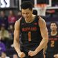 Maryland guard Anthony Cowan Jr. (1) gestures after making a three point basket against Northwestern during the second half of an NCAA college basketball game, Tuesday, Jan. 21, 2020, in Evanston, Ill. (AP Photo/David Banks) ** FILE **
