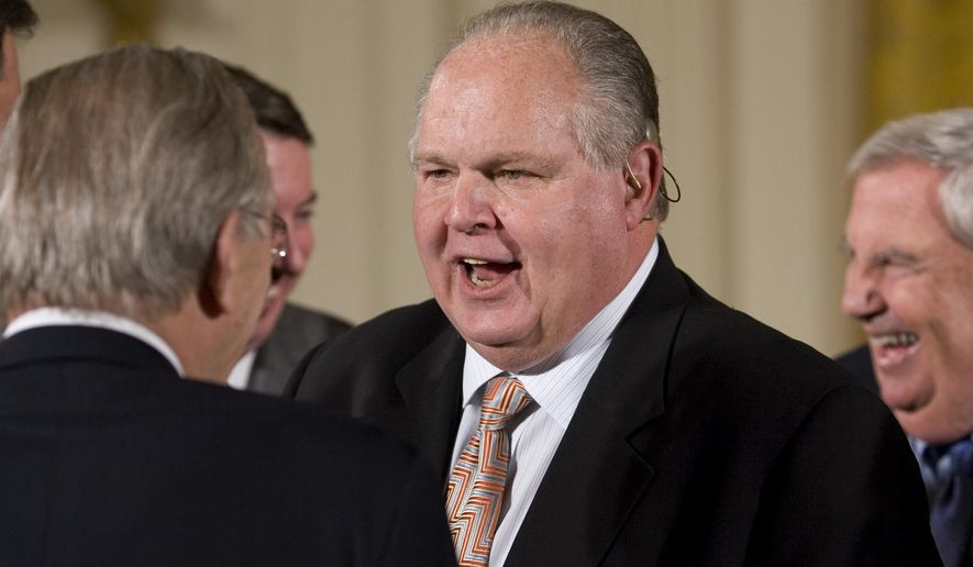 This Jan. 13, 2009 file photo shows conservative talk radio host Rush Limbaugh talks with former Defense Secretary Donald H. Rumsfeld, left, in the East Room of the White House in Washington. (AP Photo/J. Scott Applewhite, File)