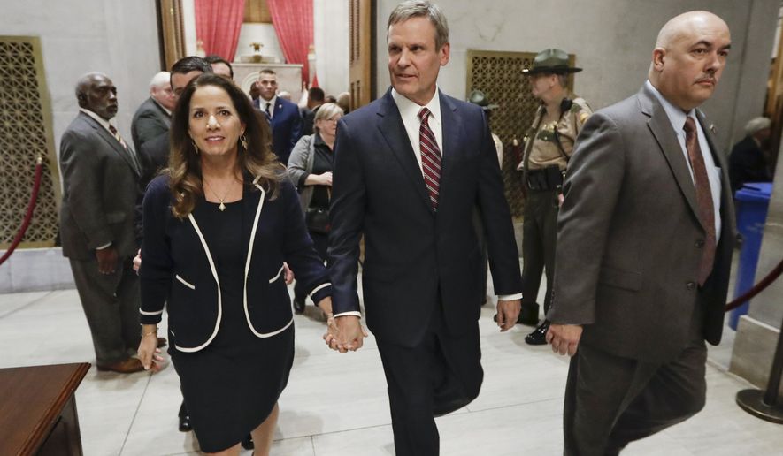 Tennessee Gov. Bill Lee, center, and his wife, Maria, leave the House Chamber after Lee gave his State of the State Address Monday, Feb. 3, 2020, in Nashville, Tenn. (AP Photo/Mark Humphrey)