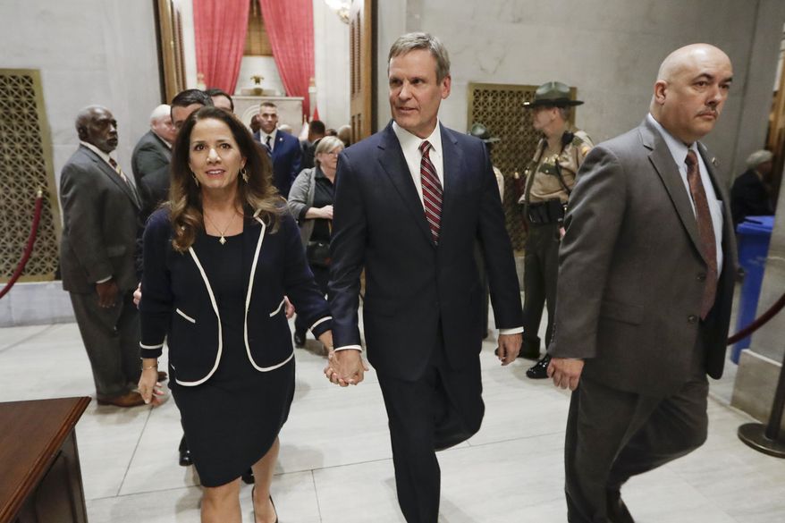 Tennessee Gov. Bill Lee, center, and his wife, Maria, leave the House Chamber after Lee gave his State of the State Address Monday, Feb. 3, 2020, in Nashville, Tenn. (AP Photo/Mark Humphrey)