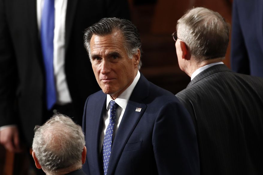 Sen. Mitt Romney, R-Utah, arrives before President Donald Trump delivers his State of the Union address to a joint session of Congress on Capitol Hill in Washington, Tuesday, Feb. 4, 2020. (AP Photo/Patrick Semansky)