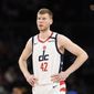 Washington Wizards forward Davis Bertans (42) stands on the court during the second half of an NBA basketball game against the Golden State Warriors, Monday, Feb. 3, 2020, in Washington. The Warriors won 125-117. (AP Photo/Nick Wass) ** FILE **