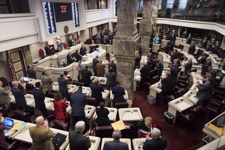 File-This Jan. 8, 2019, file photo shows the Alabama House of Representatives convending during the 2019 Alabama Legislature organizational session at the Alabama State House in Montgomery, Ala. A state prison crisis and gambling legislation are expected to be top topics when lawmakers return to Montgomery next week. The Alabama Legislature begins the 2020 legislative session on Tuesday, Feb. 4, 2020. Lawmakers are expected to debate additional funding for state prisons and a package of bills aimed at reducing recidivism and prison crowding. Lottery legislation is also being introduced this year. Alabama Gov. Kay Ivey will giver her annual State of the State address Tuesday night. (Jake Crandall/The Montgomery Advertiser via AP, File)