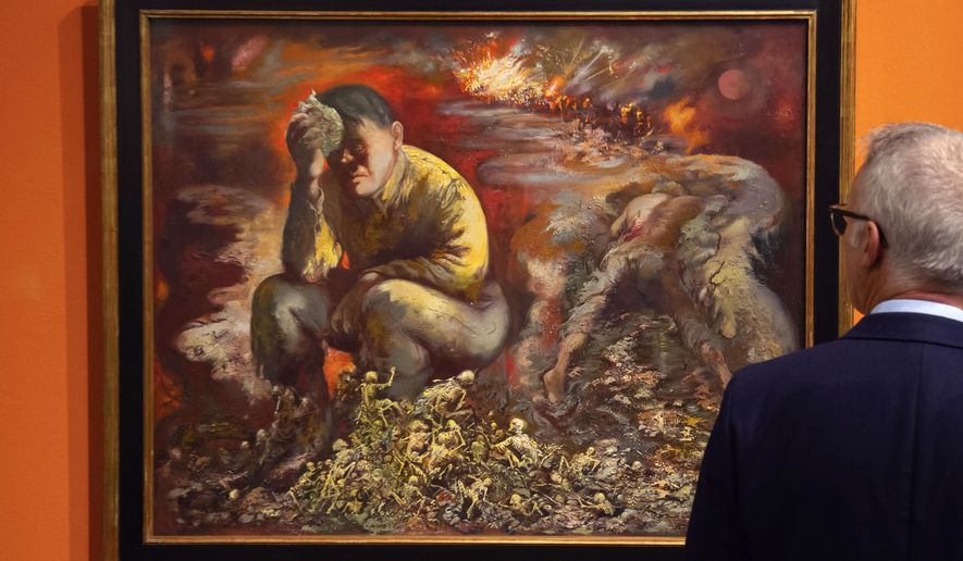 A man looks at a 1944 painting &amp;quot;Cain or Hitler in Hell&amp;quot;, by George Grosz, during a press preview at the German Historical Museum in Berlin, Germany, Tuesday, Feb. 4, 2020. The 1944 painting, which will become part of a new permanent exhibition, depicts a broken Hitler sitting among skeletons as war rages behind him, and helps illustrate &amp;quot;how Grosz further developed his critical form after emigration,&amp;quot; said Markus Hilgert, a senior German cultural official.  (AP Photo/Jens Meyer)