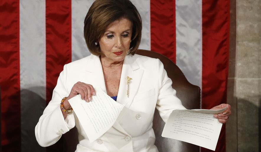 House Speaker Nancy Pelosi of Calif., tears her copy of President Donald Trump&#39;s State of the Union address after he delivered it to a joint session of Congress on Capitol Hill in Washington, Tuesday, Feb. 4, 2020. (AP Photo/Patrick Semansky)