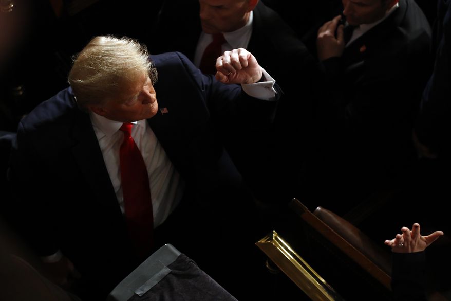 President Donald Trump greets people after delivering his State of the Union address to a joint session of Congress on Capitol Hill in Washington, Tuesday, Feb. 4, 2020. (AP Photo/Patrick Semansky)