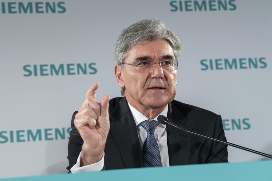 Joe Kaeser, CEO of Siemens, speaks during the Siemens Annual Shareholder's meeting in Munich, Germany, Wednesday, Feb. 5, 2020. Orders and earnings at industrial conglomerate Siemens were lower than a year earlier in the October-December period, the company said Wednesday, weighed down by weaker performances in the auto and energy sectors. (Peter Kneffel/dpa via AP)