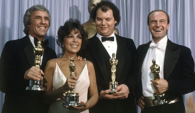 Burt Bacharach shows with best song winners ?Arthur?s Theme? at the 54th Annual Academy Awards in Los Angeles on March 29, 1982. Oscar for best song went to ?Arthur?s Theme? from movie ?Arthur?. Others with him are Carole Bayer Sager, Christopher Cross and Peter Allen. (AP Photo/Reed Saxon)