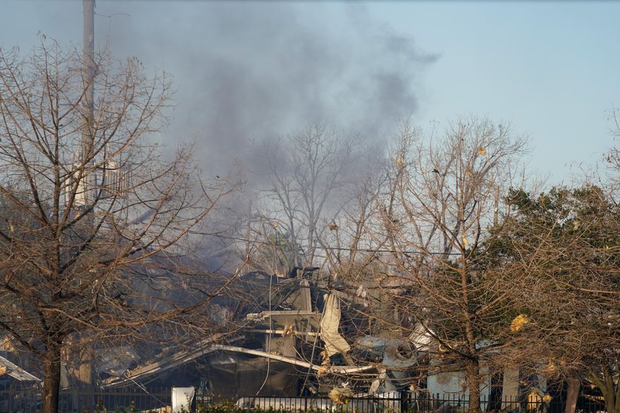 FILE - In a Friday, Jan. 24, 2020 file photo, smoke fills the sky after a massive explosion in Houston, Texas. Watson Grinding and Manufacturing said Thursday, Feb. 6, 2020 it filed for Chapter 11 bankruptcy in Houston federal court because of what it expects to be “a long-term interruption of business operations” due to the Jan. 24 blast. (Melissa Phillips/Houston Chronicle via AP, File)